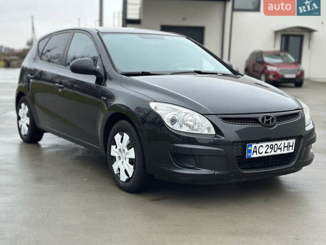Чорний Хендай i30, об'ємом двигуна 1.4 л та пробігом 204 тис. км за 5950 $, фото 2 на Automoto.ua