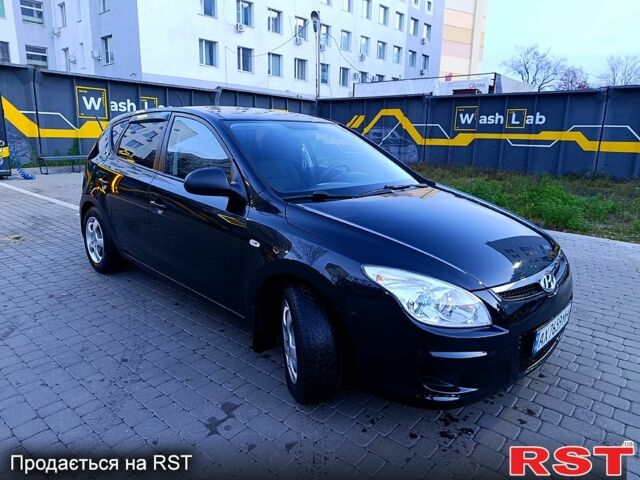 Черный Хендай i30, объемом двигателя 1.4 л и пробегом 170 тыс. км за 5800 $, фото 1 на Automoto.ua