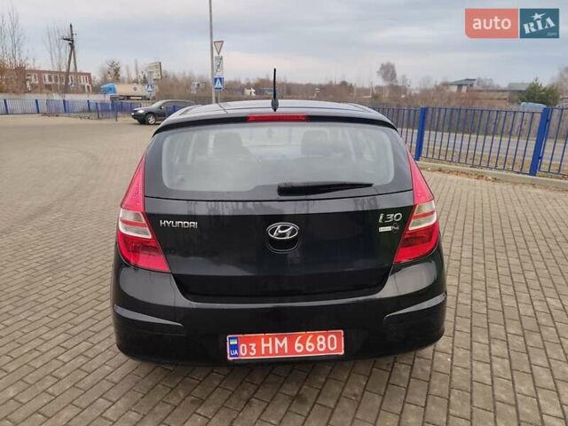 Чорний Хендай i30, об'ємом двигуна 1.4 л та пробігом 161 тис. км за 5700 $, фото 5 на Automoto.ua