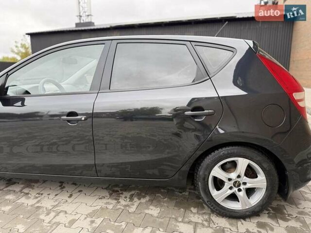Черный Хендай i30, объемом двигателя 1.4 л и пробегом 180 тыс. км за 4990 $, фото 26 на Automoto.ua