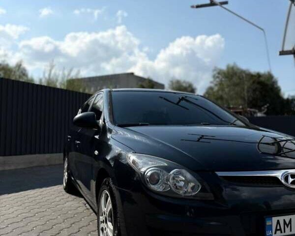 Черный Хендай i30, объемом двигателя 1.4 л и пробегом 148 тыс. км за 6650 $, фото 6 на Automoto.ua