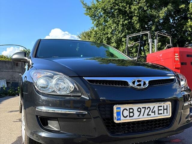 Черный Хендай i30, объемом двигателя 1.4 л и пробегом 232 тыс. км за 5200 $, фото 5 на Automoto.ua