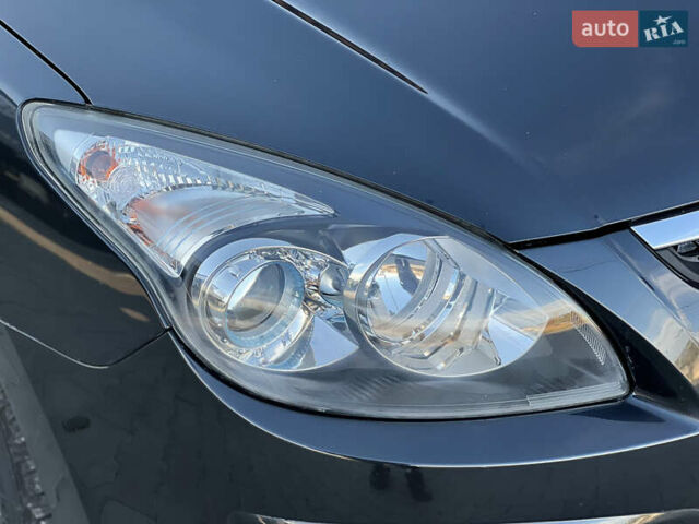 Черный Хендай i30, объемом двигателя 1.4 л и пробегом 167 тыс. км за 6299 $, фото 6 на Automoto.ua
