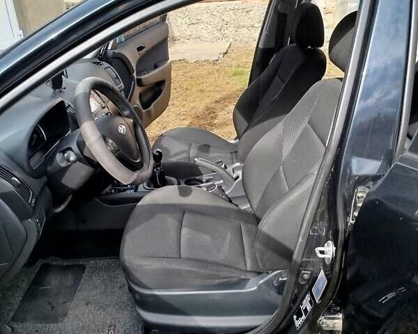 Черный Хендай i30, объемом двигателя 1.4 л и пробегом 215 тыс. км за 5000 $, фото 14 на Automoto.ua