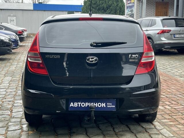 Черный Хендай i30, объемом двигателя 1.4 л и пробегом 240 тыс. км за 6000 $, фото 3 на Automoto.ua