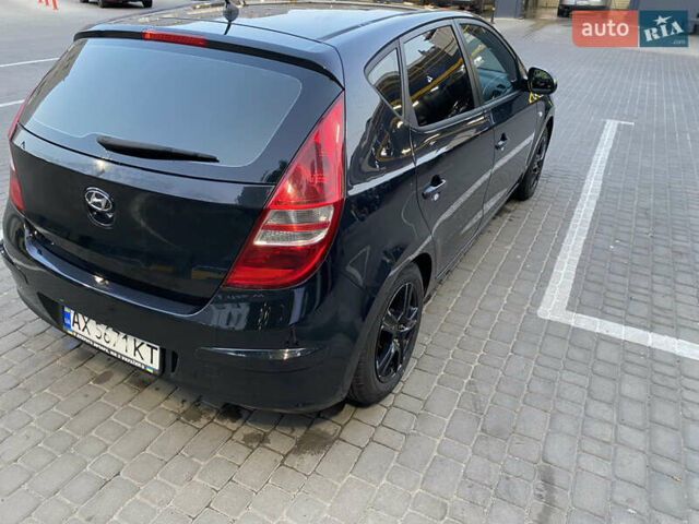 Черный Хендай i30, объемом двигателя 1.4 л и пробегом 194 тыс. км за 6000 $, фото 3 на Automoto.ua