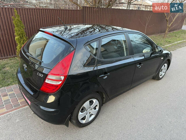 Черный Хендай i30, объемом двигателя 1.4 л и пробегом 194 тыс. км за 6350 $, фото 15 на Automoto.ua