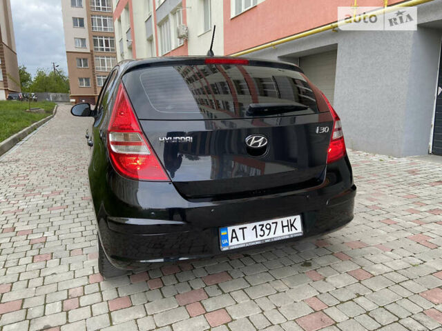 Чорний Хендай i30, об'ємом двигуна 1.4 л та пробігом 211 тис. км за 5800 $, фото 5 на Automoto.ua