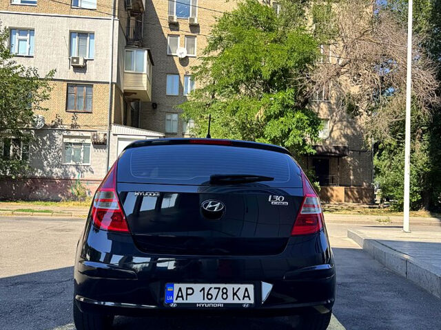 Чорний Хендай i30, об'ємом двигуна 1.6 л та пробігом 190 тис. км за 6300 $, фото 4 на Automoto.ua