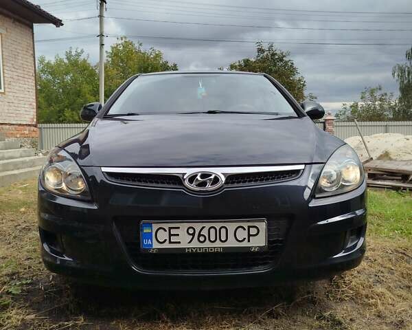Черный Хендай i30, объемом двигателя 1.4 л и пробегом 215 тыс. км за 5500 $, фото 3 на Automoto.ua