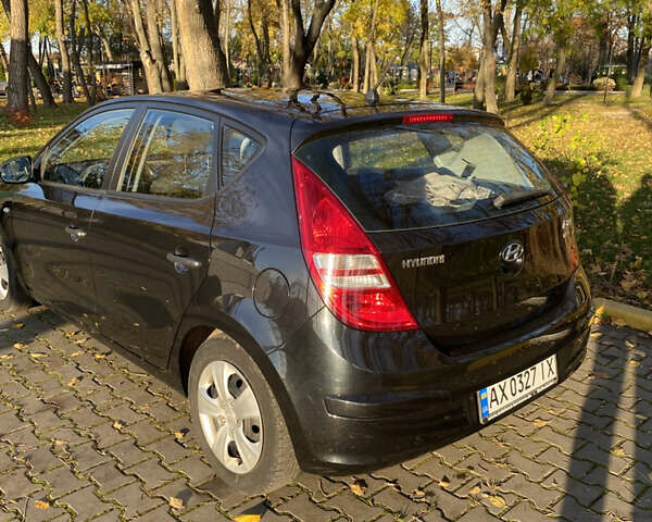 Черный Хендай i30, объемом двигателя 1.4 л и пробегом 242 тыс. км за 6000 $, фото 11 на Automoto.ua