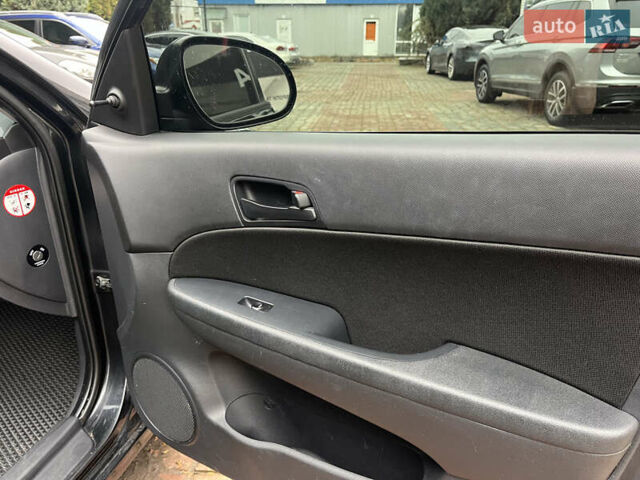 Черный Хендай i30, объемом двигателя 1.4 л и пробегом 240 тыс. км за 6000 $, фото 21 на Automoto.ua