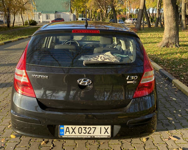 Черный Хендай i30, объемом двигателя 1.4 л и пробегом 242 тыс. км за 6000 $, фото 13 на Automoto.ua