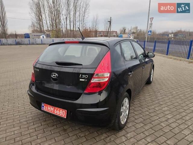 Чорний Хендай i30, об'ємом двигуна 1.4 л та пробігом 161 тис. км за 5700 $, фото 6 на Automoto.ua