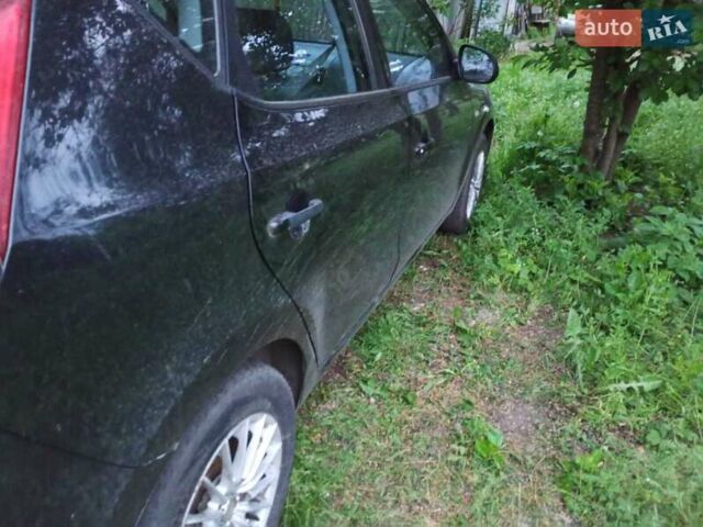 Черный Хендай i30, объемом двигателя 1.6 л и пробегом 300 тыс. км за 4000 $, фото 7 на Automoto.ua