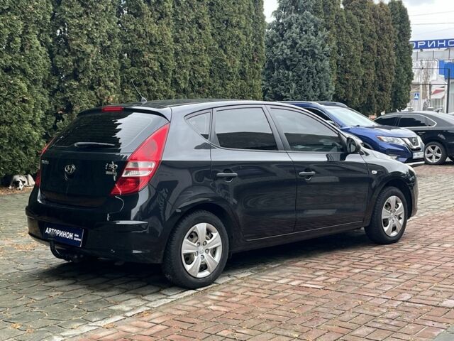 Черный Хендай i30, объемом двигателя 1.4 л и пробегом 240 тыс. км за 6000 $, фото 2 на Automoto.ua