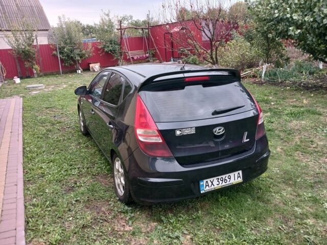 Черный Хендай i30, объемом двигателя 1.4 л и пробегом 139 тыс. км за 6200 $, фото 3 на Automoto.ua