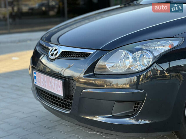 Черный Хендай i30, объемом двигателя 1.4 л и пробегом 167 тыс. км за 6299 $, фото 4 на Automoto.ua
