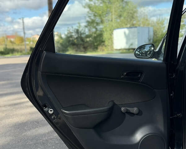 Хендай i30 2009 в Виннице на Automoto.ua Черный Хендай i30, объемом двигателя 1.4 л и пробегом 167 тыс. км за 6100 $, фото 18 на Automoto.ua