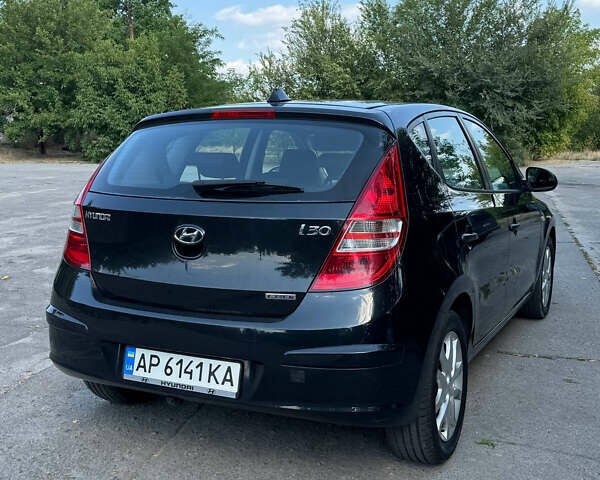 Чорний Хендай i30, об'ємом двигуна 1.6 л та пробігом 250 тис. км за 5700 $, фото 4 на Automoto.ua