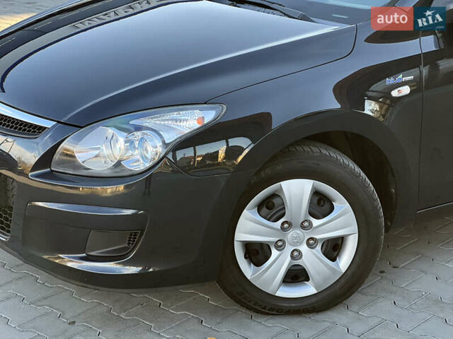 Черный Хендай i30, объемом двигателя 1.4 л и пробегом 167 тыс. км за 6299 $, фото 3 на Automoto.ua