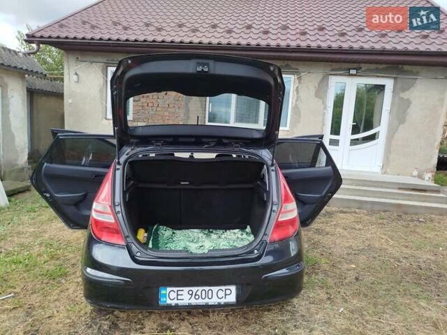 Черный Хендай i30, объемом двигателя 1.4 л и пробегом 215 тыс. км за 5000 $, фото 26 на Automoto.ua
