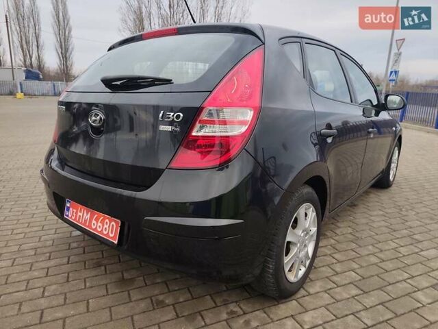 Чорний Хендай i30, об'ємом двигуна 1.4 л та пробігом 161 тис. км за 5700 $, фото 11 на Automoto.ua