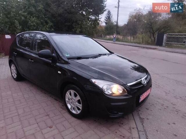 Чорний Хендай i30, об'ємом двигуна 1.4 л та пробігом 158 тис. км за 5750 $, фото 3 на Automoto.ua