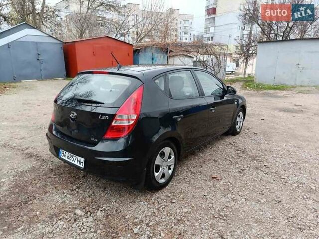 Черный Хендай i30, объемом двигателя 1.4 л и пробегом 314 тыс. км за 5650 $, фото 11 на Automoto.ua