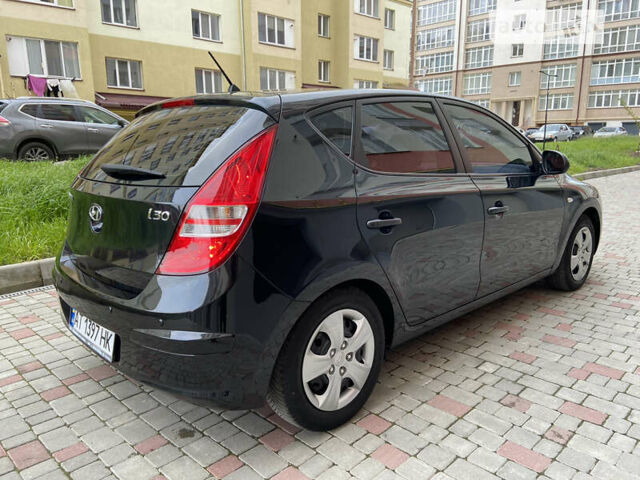 Чорний Хендай i30, об'ємом двигуна 1.4 л та пробігом 211 тис. км за 5800 $, фото 7 на Automoto.ua