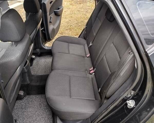 Черный Хендай i30, объемом двигателя 1.4 л и пробегом 215 тыс. км за 5000 $, фото 18 на Automoto.ua