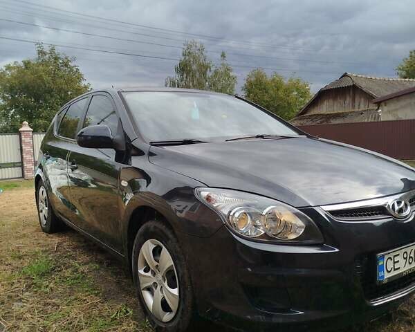 Черный Хендай i30, объемом двигателя 1.4 л и пробегом 215 тыс. км за 5500 $, фото 1 на Automoto.ua