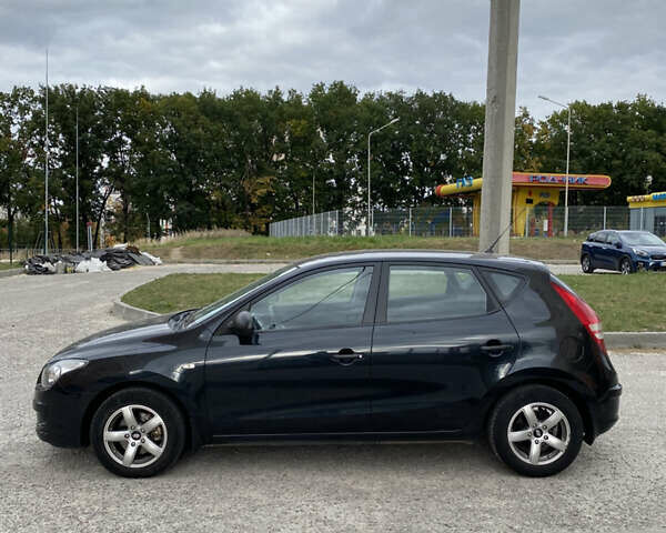 Черный Хендай i30, объемом двигателя 1.4 л и пробегом 148 тыс. км за 5900 $, фото 7 на Automoto.ua