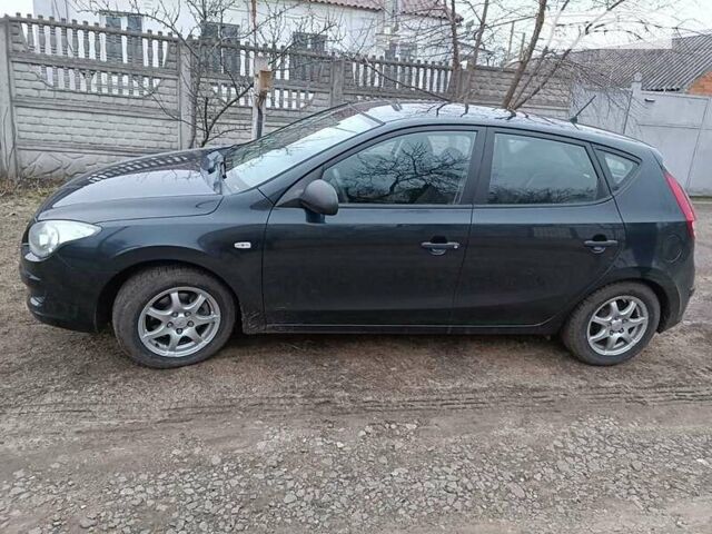 Чорний Хендай i30, об'ємом двигуна 1.4 л та пробігом 195 тис. км за 5900 $, фото 2 на Automoto.ua