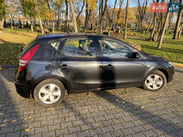 Черный Хендай i30, объемом двигателя 1.4 л и пробегом 242 тыс. км за 6000 $, фото 7 на Automoto.ua