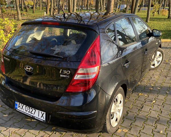 Черный Хендай i30, объемом двигателя 1.4 л и пробегом 242 тыс. км за 6000 $, фото 9 на Automoto.ua