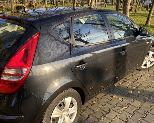 Черный Хендай i30, объемом двигателя 1.4 л и пробегом 242 тыс. км за 6000 $, фото 8 на Automoto.ua