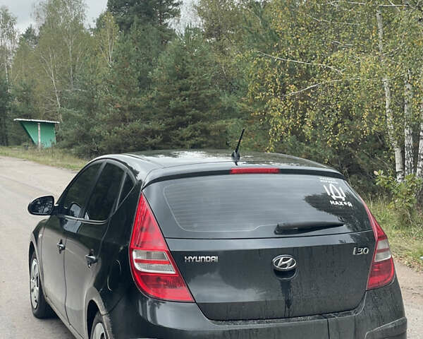 Чорний Хендай i30, об'ємом двигуна 1.4 л та пробігом 223 тис. км за 5500 $, фото 4 на Automoto.ua