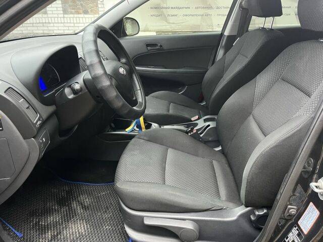 Черный Хендай i30, объемом двигателя 1.4 л и пробегом 240 тыс. км за 6000 $, фото 10 на Automoto.ua