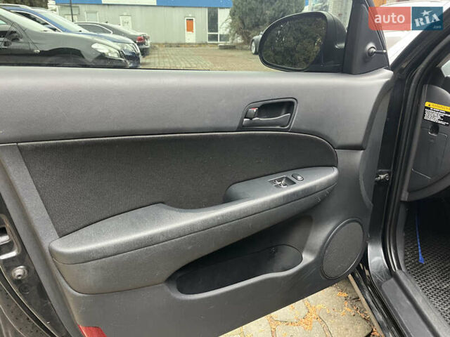 Черный Хендай i30, объемом двигателя 1.4 л и пробегом 240 тыс. км за 6000 $, фото 10 на Automoto.ua