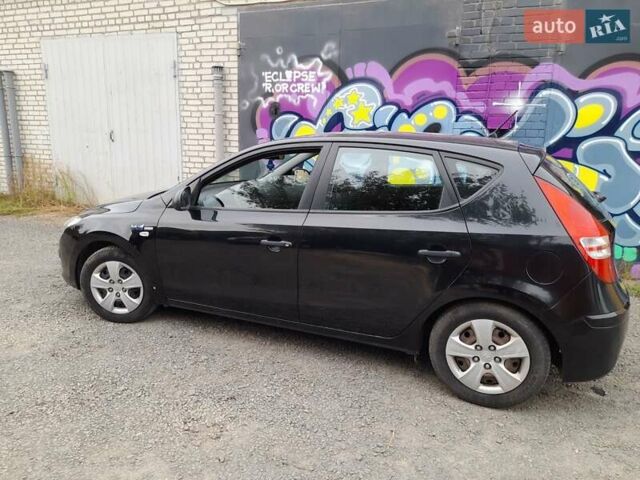 Чорний Хендай i30, об'ємом двигуна 1.4 л та пробігом 193 тис. км за 4850 $, фото 6 на Automoto.ua