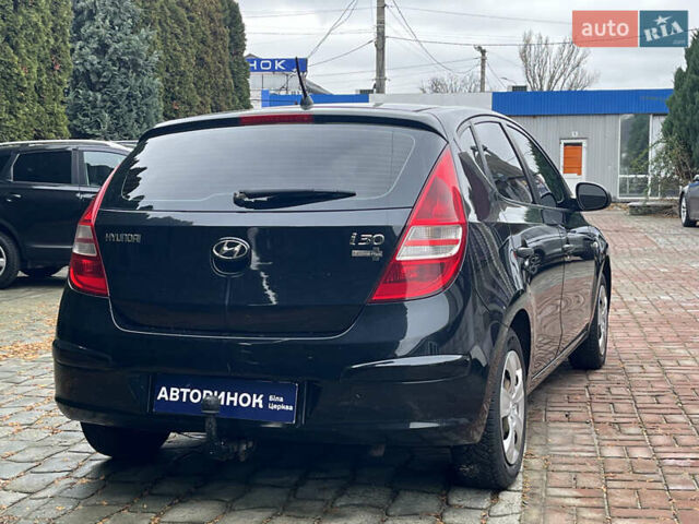 Черный Хендай i30, объемом двигателя 1.4 л и пробегом 240 тыс. км за 6000 $, фото 4 на Automoto.ua