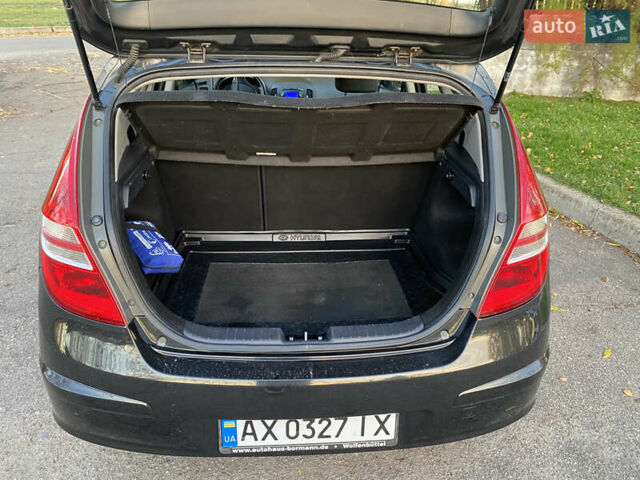 Черный Хендай i30, объемом двигателя 1.4 л и пробегом 242 тыс. км за 6000 $, фото 14 на Automoto.ua