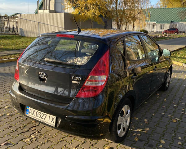 Черный Хендай i30, объемом двигателя 1.4 л и пробегом 242 тыс. км за 6000 $, фото 12 на Automoto.ua