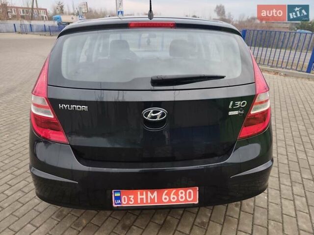 Чорний Хендай i30, об'ємом двигуна 1.4 л та пробігом 161 тис. км за 5700 $, фото 12 на Automoto.ua