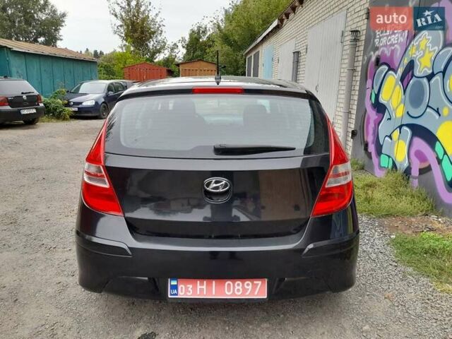 Чорний Хендай i30, об'ємом двигуна 1.4 л та пробігом 193 тис. км за 4850 $, фото 5 на Automoto.ua