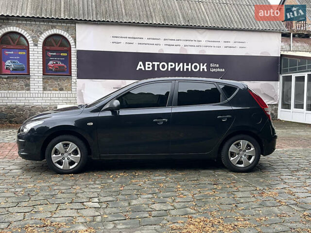 Черный Хендай i30, объемом двигателя 1.4 л и пробегом 240 тыс. км за 6000 $, фото 7 на Automoto.ua