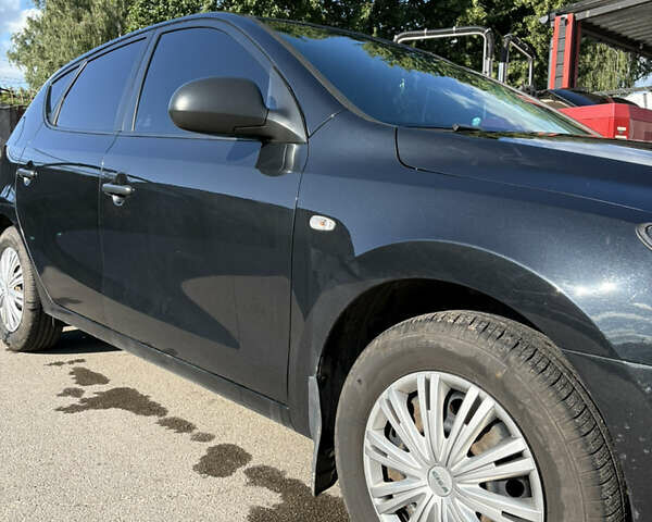 Черный Хендай i30, объемом двигателя 1.4 л и пробегом 237 тыс. км за 5000 $, фото 1 на Automoto.ua