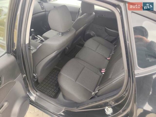 Черный Хендай i30, объемом двигателя 1.4 л и пробегом 160 тыс. км за 5999 $, фото 12 на Automoto.ua