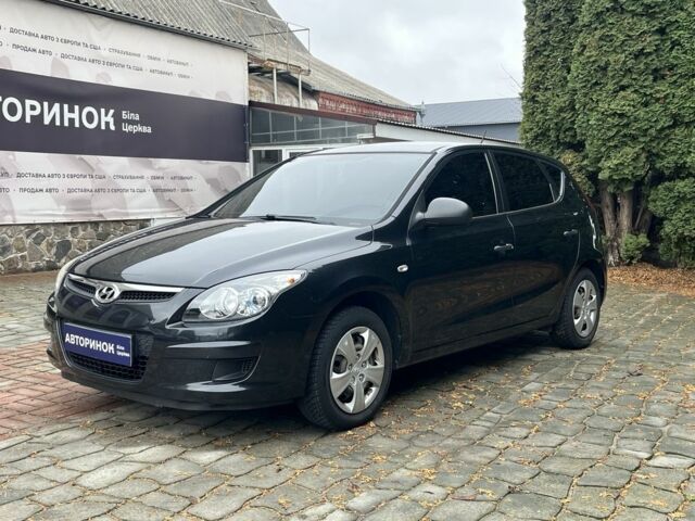 Черный Хендай i30, объемом двигателя 1.4 л и пробегом 240 тыс. км за 6000 $, фото 5 на Automoto.ua
